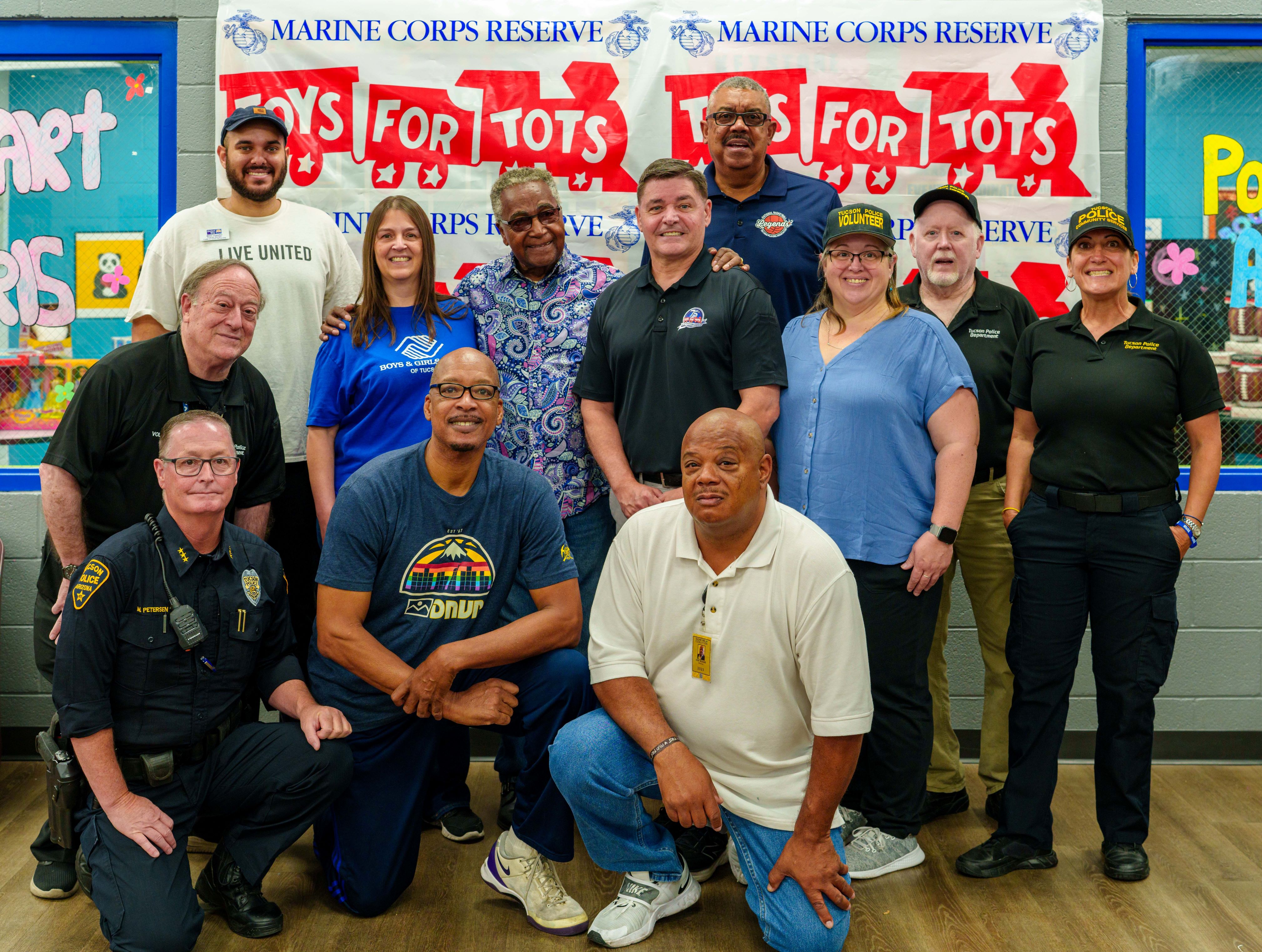 TPD Volunteers and Community members at Toys 4 Tots event