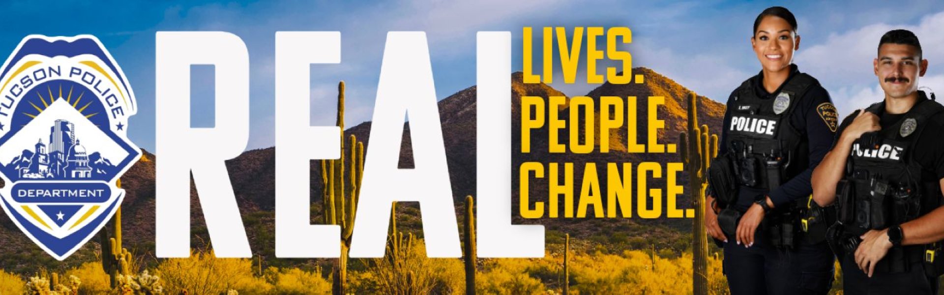 2 Officers standing smiling